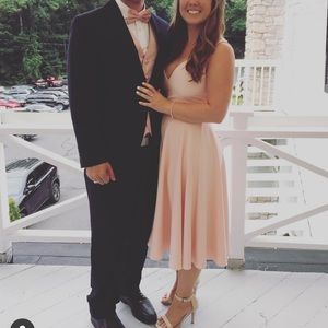 Light pink midi dress.